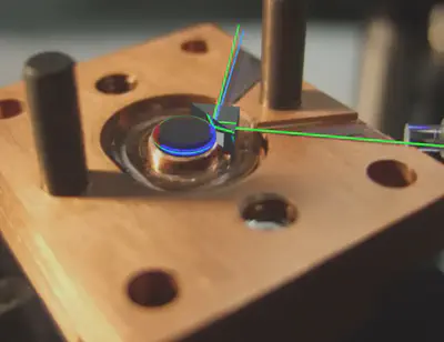 Microwave cavity with rendering of optical WGM resonator